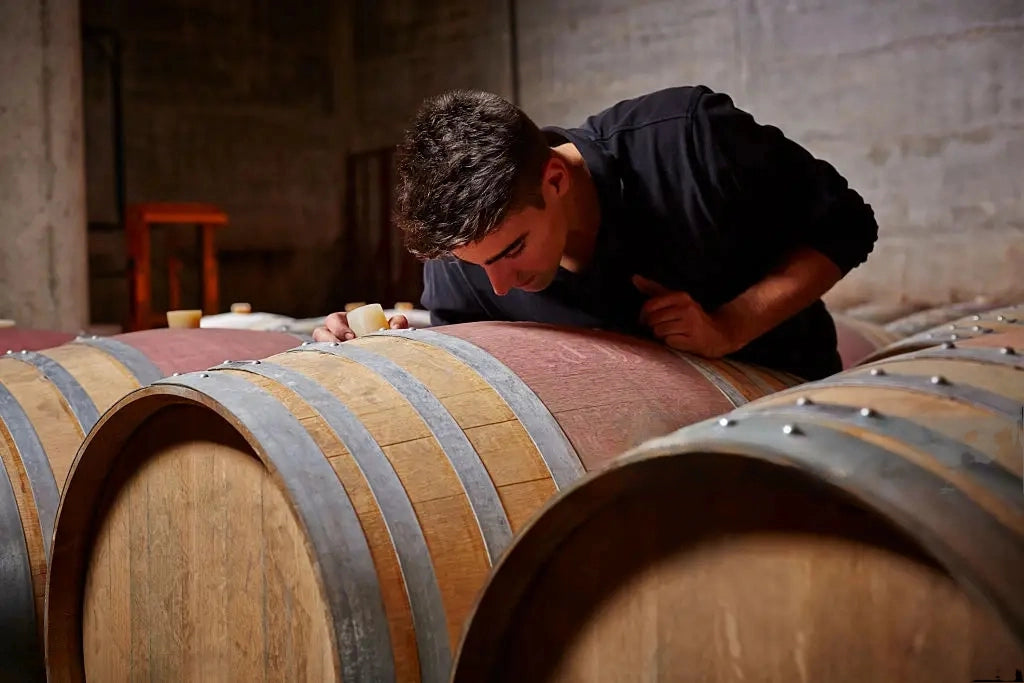 Italian Winemaker Claudio Galosi And A Group Of Oenologists