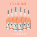 Six bottles of Sud de France Rose Wine arranged neatly, with the text 'FRENCH ROSE' and 'THE ROSÉ DAY' displayed above and below the bottles respectively.